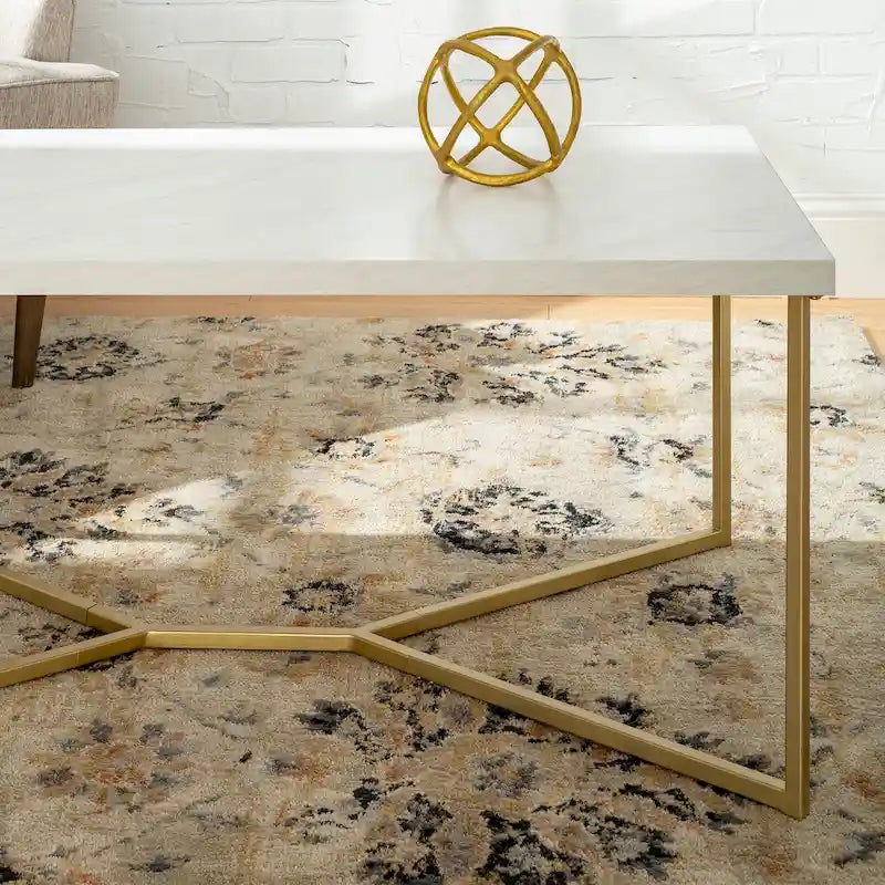 Couchtisch mit X-Gestell aus Metall