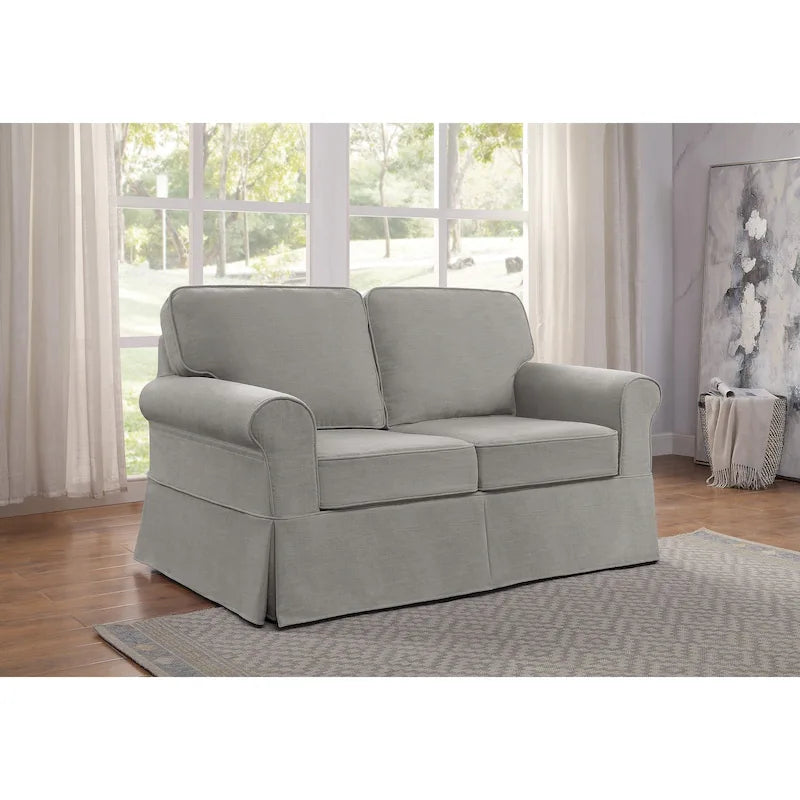 Dwuosobowa sofa z pokrowcem i zaokrąglonymi podłokietnikami