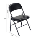 Schwarze Klappstühle mit gepolsterter Sitzfläche und Rückenlehne