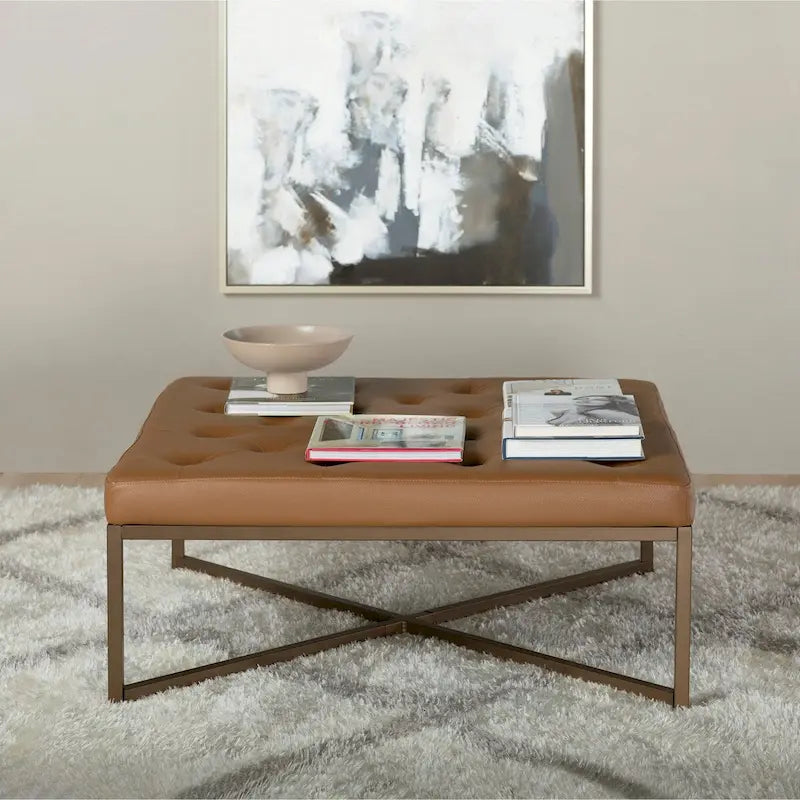 Gepolsterter Ottoman aus gebundenem Leder mit Metallrahmen